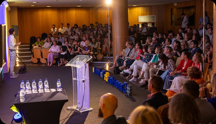Crowd of people listening to a speech